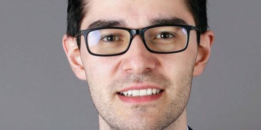 Uni-Absolvent gewann Premiere von Ökonomie-Wettbewerb