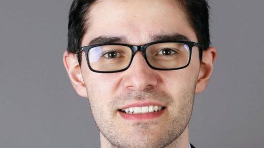 Uni-Absolvent gewann Premiere von Ökonomie-Wettbewerb