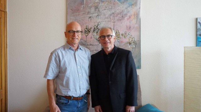 Dr. Frank Dittmar im Informationsaustausch mit Oberbürgermeister Dirk Meid